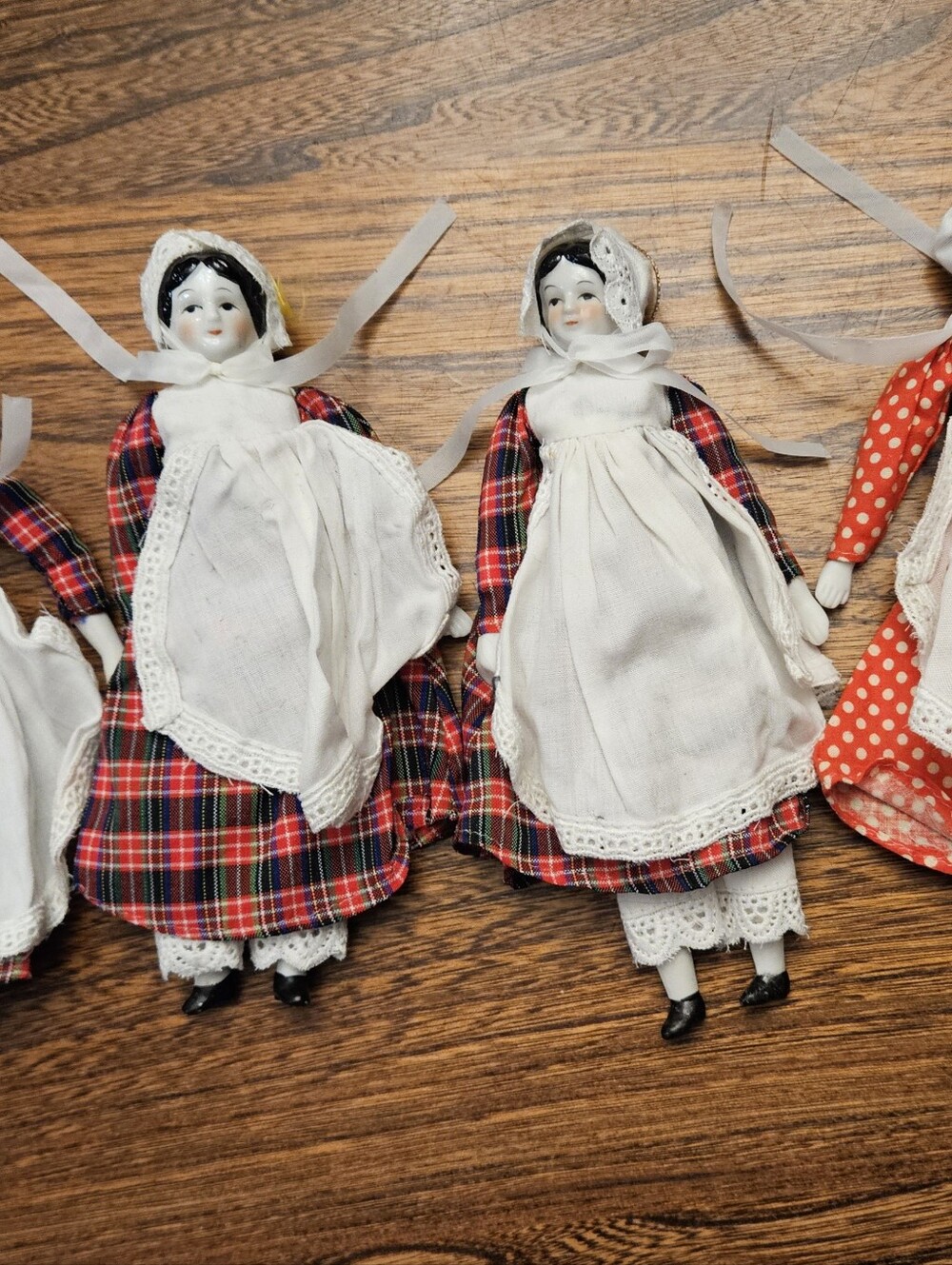 Four Vintage Silvestri Corp 7.5" Porcelain Doll. All in excellent condition.